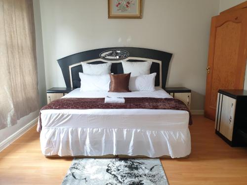 Katil atau katil-katil dalam bilik di Casa bedfordview