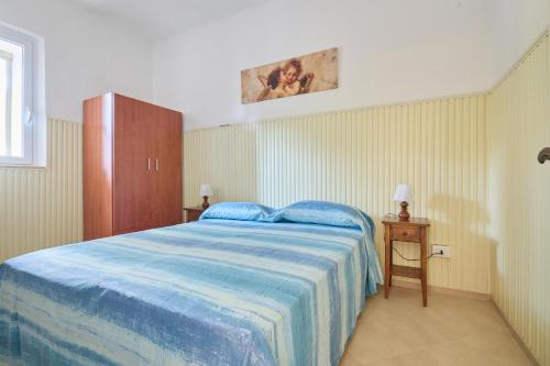 Postel nebo postele na pokoji v ubytování Mare Etrusco 3