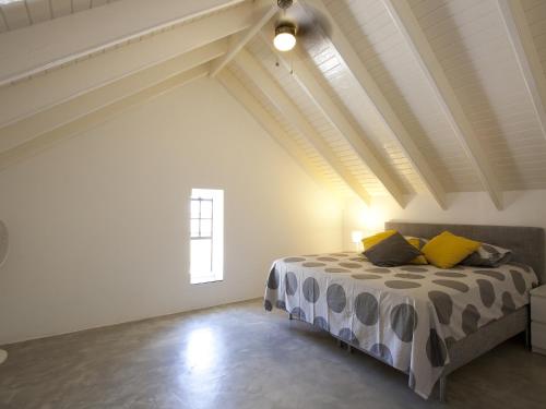 Un pat sau paturi într-o cameră la Vista Marina