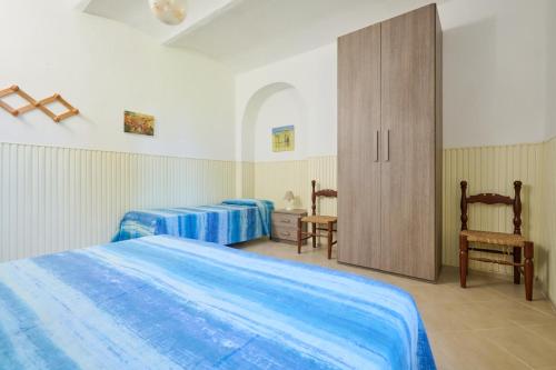 Ένα ή περισσότερα κρεβάτια σε δωμάτιο στο Mare Etrusco 9