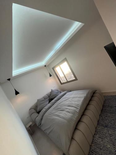 Una cama o camas en una habitación de Surf & Sea Vista