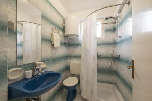 Kúpeľňa v ubytovaní Apartments Lovorik