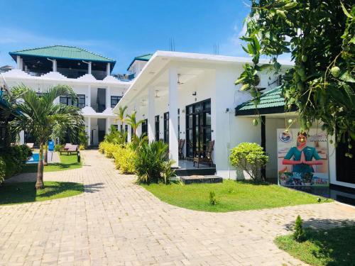 Jardín al aire libre en SKY SEA-Arugambay