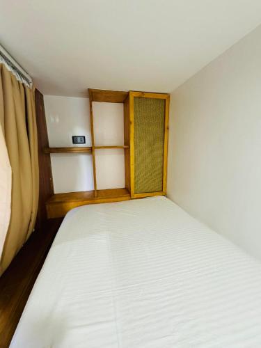 Кровать или кровати в номере Casavia Siargao
