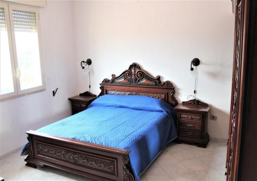 Un pat sau paturi într-o cameră la villa bel vedere by salentolimit