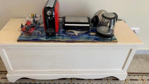 a table with some items on top of it at villa verde sul mare in Vietri sul Mare