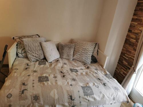 Postel nebo postele na pokoji v ubytování Charmant appartement balcon et parking