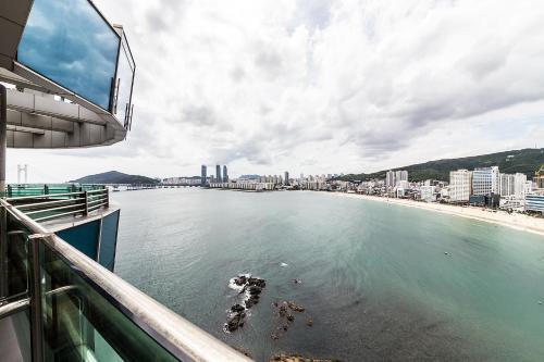 a view of the ocean from a cruise ship at H Avenue Hotel Gwangalli branch in Busan