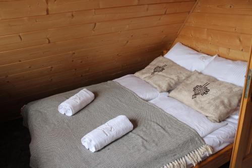 Säng eller sängar i ett rum på Gazdówka na Brzyzku