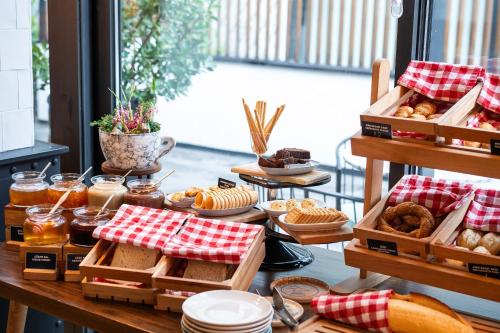 a table topped with lots of different types of food at Room Mate Emir, Istanbul in Istanbul