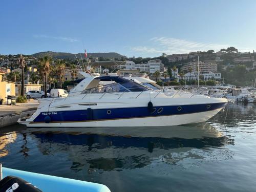 a blue and white boat sitting in the water at Bateau Cranchi 47 Méditerranée 1150cv in Cannes