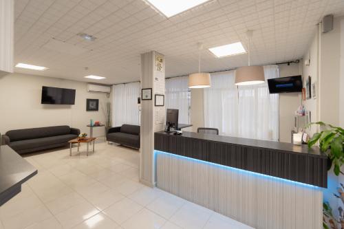 A television and/or entertainment centre at Hotel Santa Faz