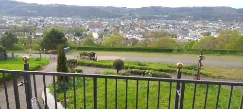 a view of a city from a balcony at Ferienwohnungen Petrisberg in Trier