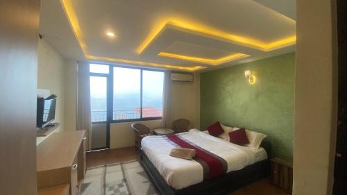 Cama o camas de una habitación en Himalayan Sunrise
