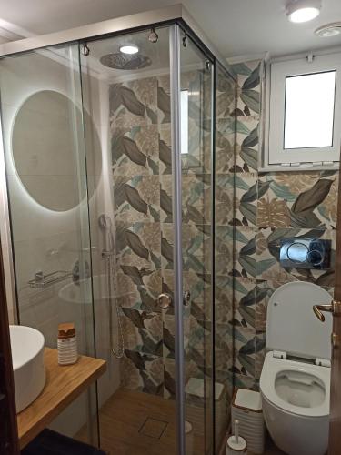 Ванная комната в Panos Apartment