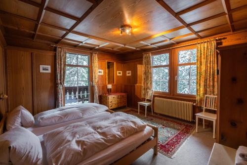 Postel nebo postele na pokoji v ubytování Chalet Surselva