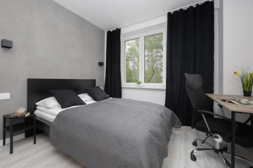 Krevet ili kreveti u jedinici u objektu Elegant Apartment Muranów Ideal for Remote Work by Renters
