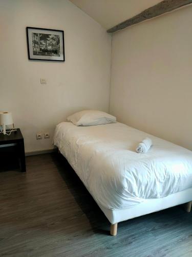 Katil atau katil-katil dalam bilik di Gîte Le Rempart - 3 étoiles - 6 personnes -
