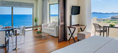 a hotel room with a view of the ocean at Elysium Resort & Spa in Faliraki