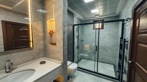 Deluxe Triple Stone Room with Balcony