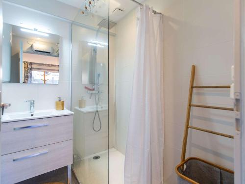 a bathroom with a shower and a sink at Maison Luz-Saint-Sauveur, 3 pièces, 4 personnes - FR-1-402-130 in Luz-Saint-Sauveur