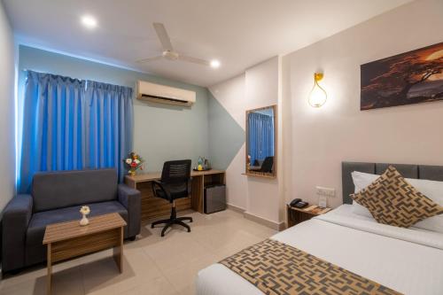 Ένα ή περισσότερα κρεβάτια σε δωμάτιο στο Hotel Seasons Inn