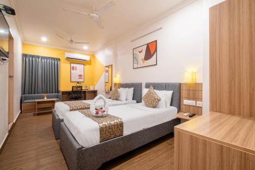 Ένα ή περισσότερα κρεβάτια σε δωμάτιο στο Hotel Seasons Inn