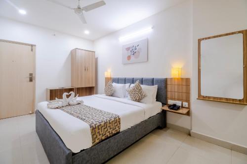 Ένα ή περισσότερα κρεβάτια σε δωμάτιο στο Hotel Seasons Inn