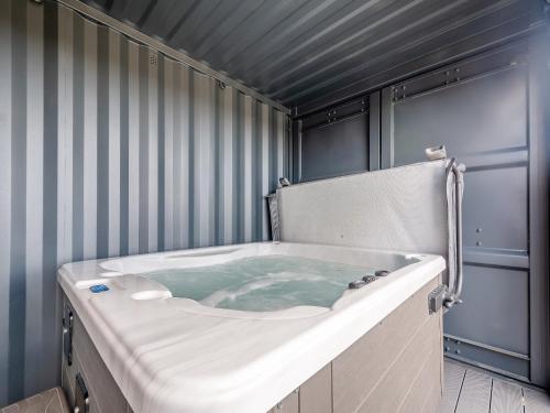 a jacuzzi tub in a room with at Galloway Views - Uk46816 in Wigtown