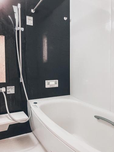Salle de bains dans l'établissement 湘南民泊kabigon