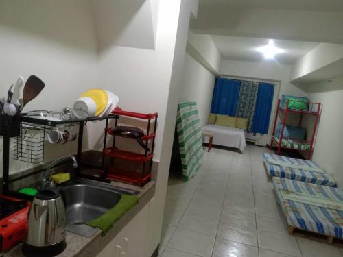 Postel nebo postele na pokoji v ubytování JY7 Room Rentals Cebu