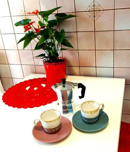 Příslušenství pro přípravu čaje a kávy v ubytování Casa Francesco