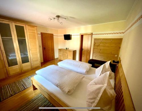 Llit o llits en una habitació de Ferienhaus Daxenberger