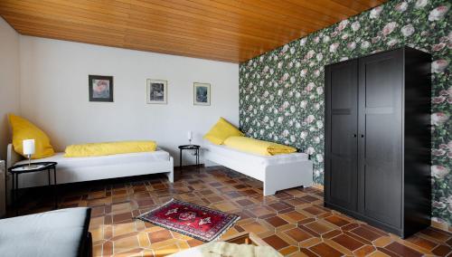 Ένα ή περισσότερα κρεβάτια σε δωμάτιο στο Wäller Garten