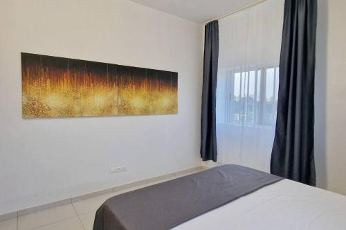 Postel nebo postele na pokoji v ubytování Casa D Oro