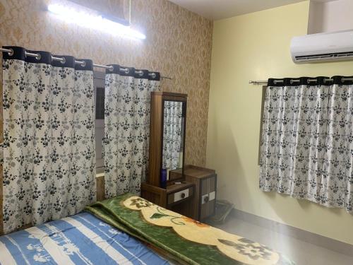 Ένα ή περισσότερα κρεβάτια σε δωμάτιο στο Sukh garden luxury stay