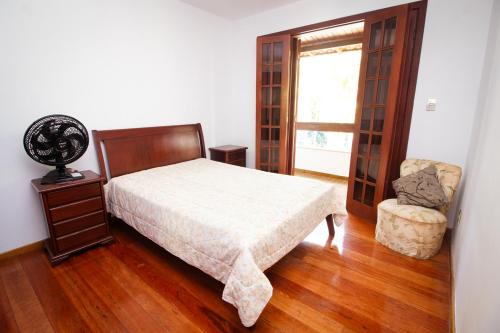 Uma cama ou camas num quarto em Chacara totalmente equipada em Juiz de Fora MG
