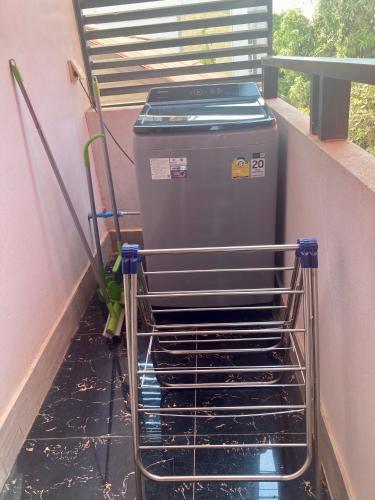 a shopping cart with a cpu in a room at Lotus Haven Villa in Siem Reap
