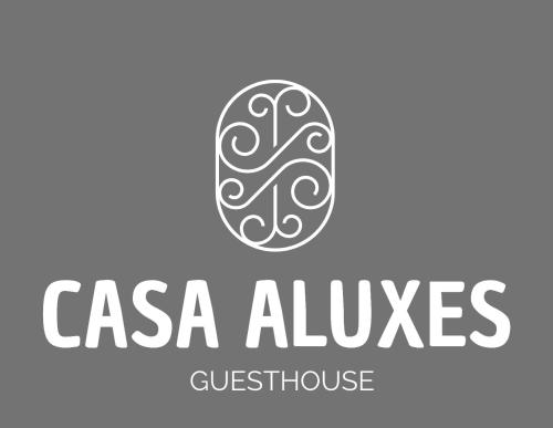 a logo for a casa alves quintessence restaurant at *CASA ALUXES- Guesthouse* in Cancún