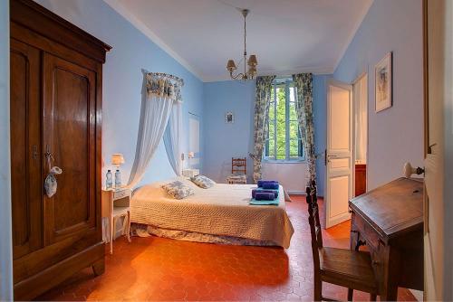 Postel nebo postele na pokoji v ubytování Château des Riaux
