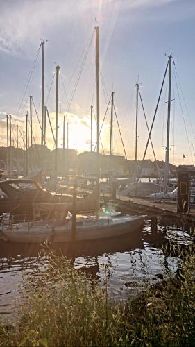 a group of boats are docked in a marina at Hafen Deern in Flensburg
