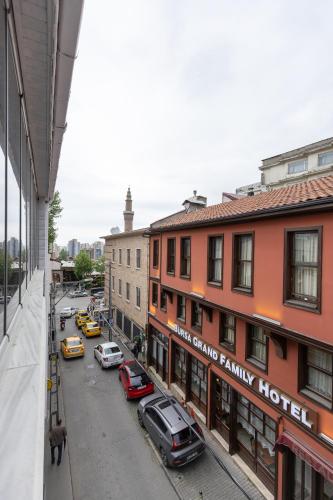 a view of a street with cars and buildings at Bursa Grand Family HOTEL in Bursa