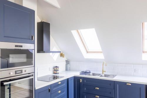 Kuchyň nebo kuchyňský kout v ubytování GuestReady - Modernised cottage in Monkstown