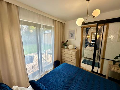 Ένα ή περισσότερα κρεβάτια σε δωμάτιο στο SPA House Wiele Dobrego