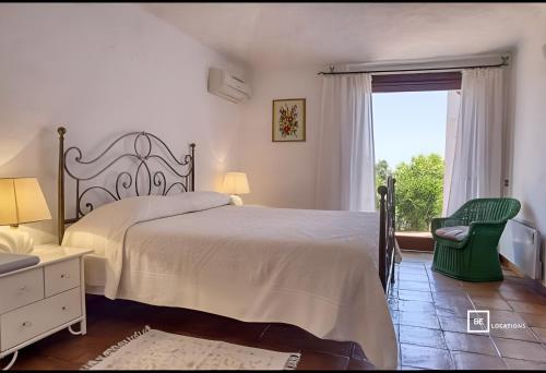 Ένα ή περισσότερα κρεβάτια σε δωμάτιο στο Belocations - Cala di Volpe Luxury Villa