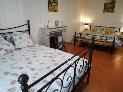 Ένα ή περισσότερα κρεβάτια σε δωμάτιο στο Chambre d'hôtes de LAMY 2
