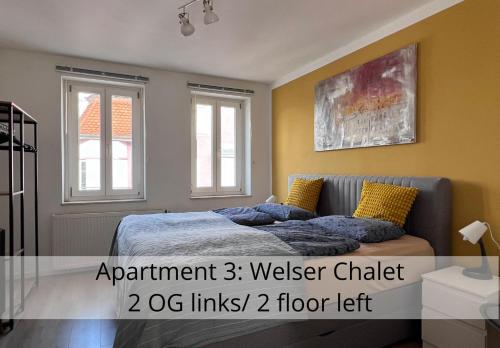 Ένα ή περισσότερα κρεβάτια σε δωμάτιο στο nice2be Apartments