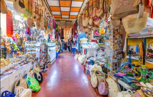 a store filled with lots of different types of shoes at Studiozentrum Agadir. in Agadir