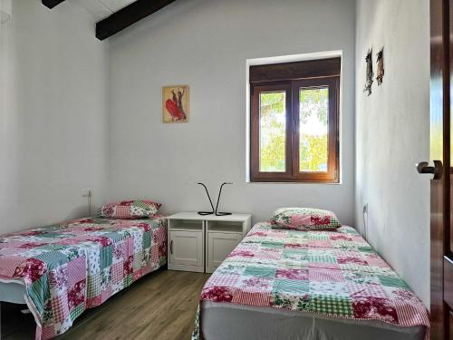 Posteľ alebo postele v izbe v ubytovaní Cortijo Airen