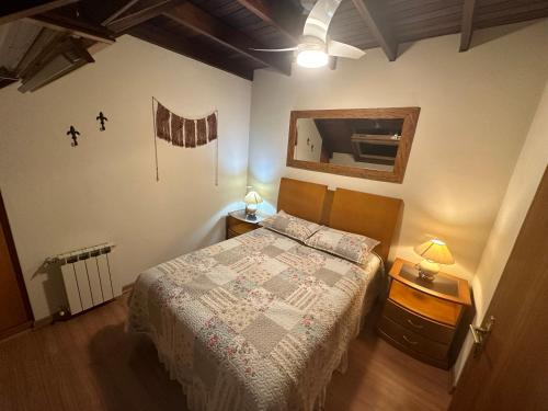 Ένα ή περισσότερα κρεβάτια σε δωμάτιο στο Bello Flat Gramado